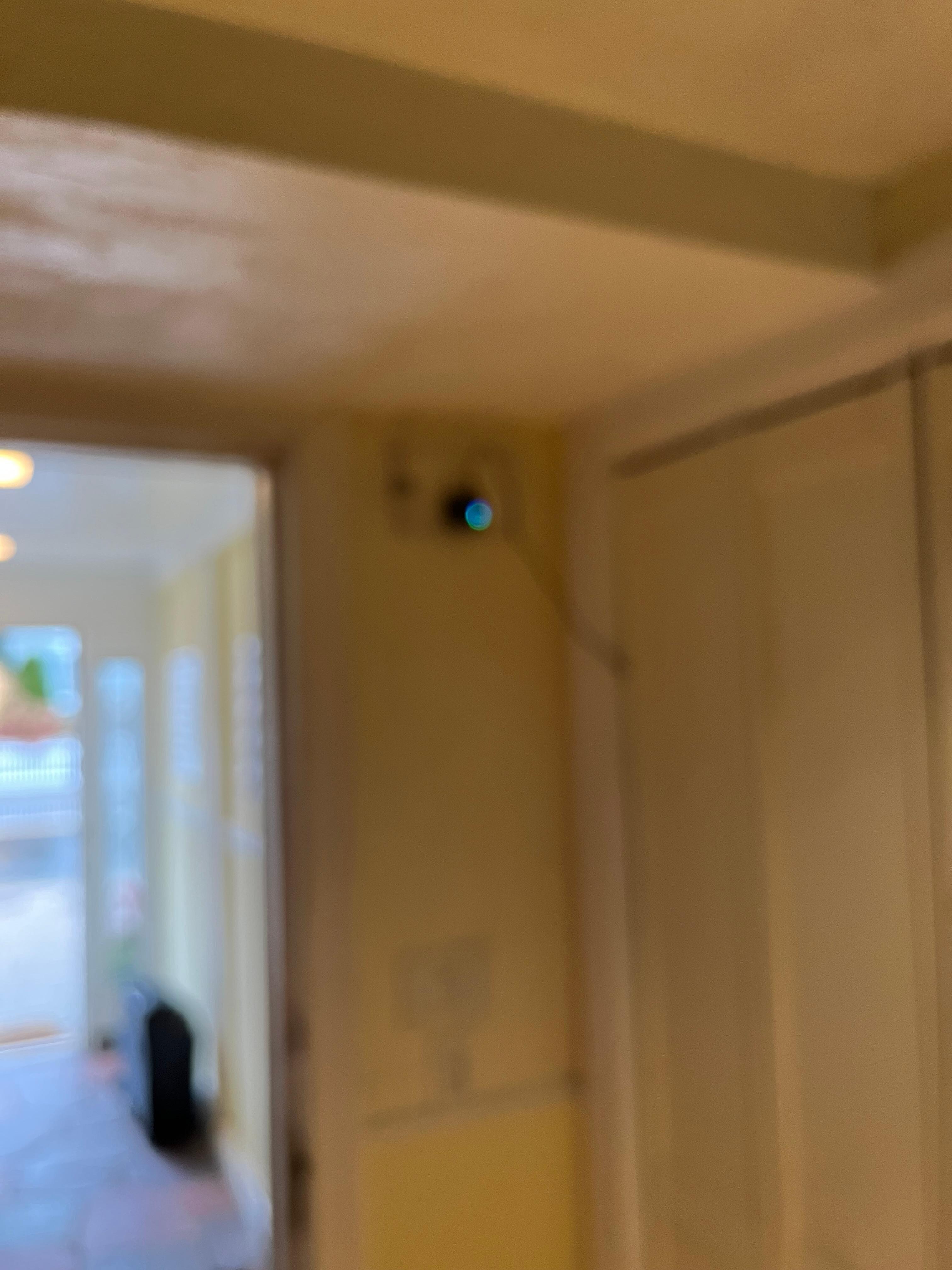 Unlisted camera in interior hallway. 