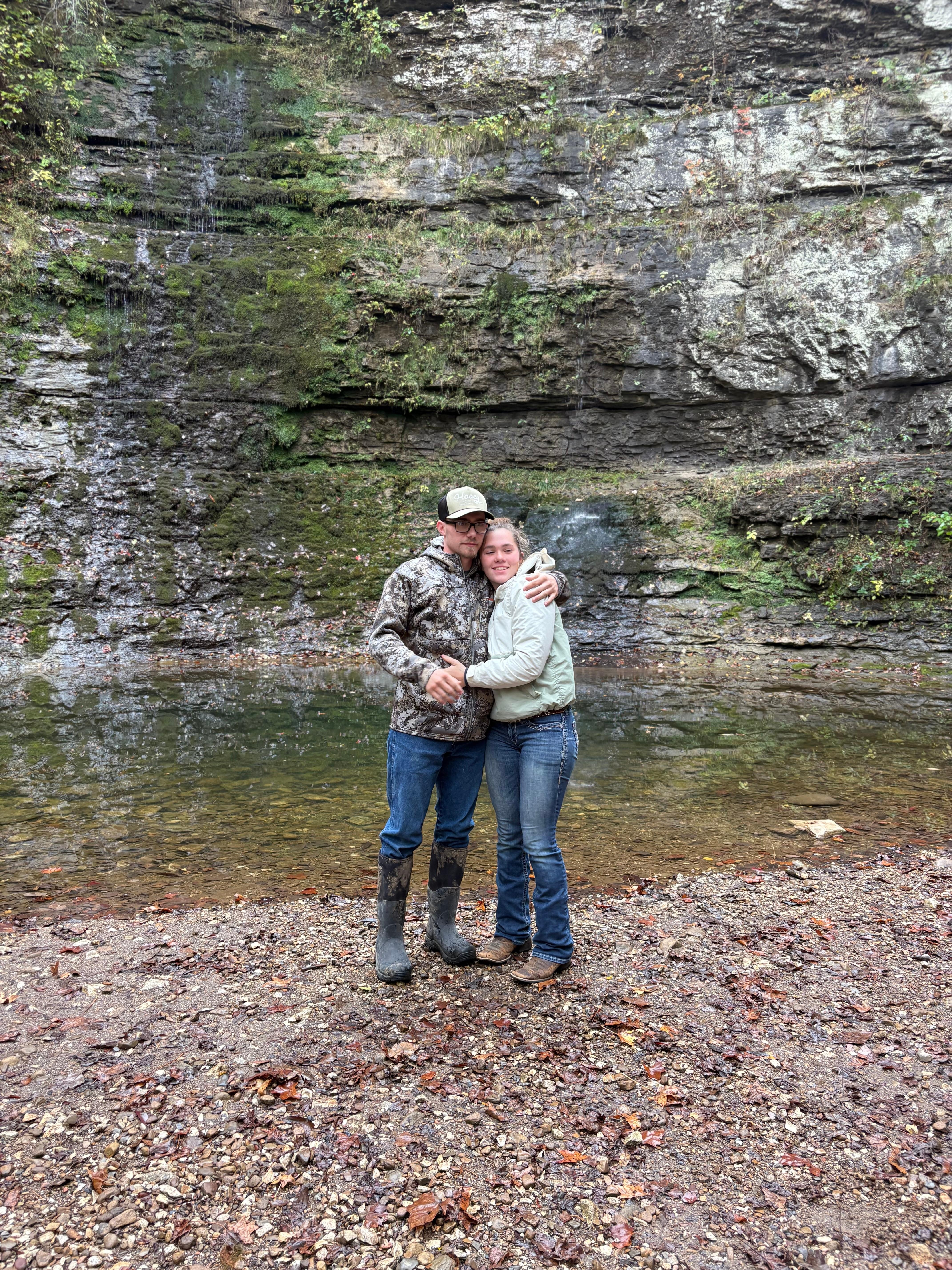 Posing in front of waterfall after she said "yes"!
