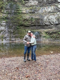 Posing in front of waterfall after she said "yes"!