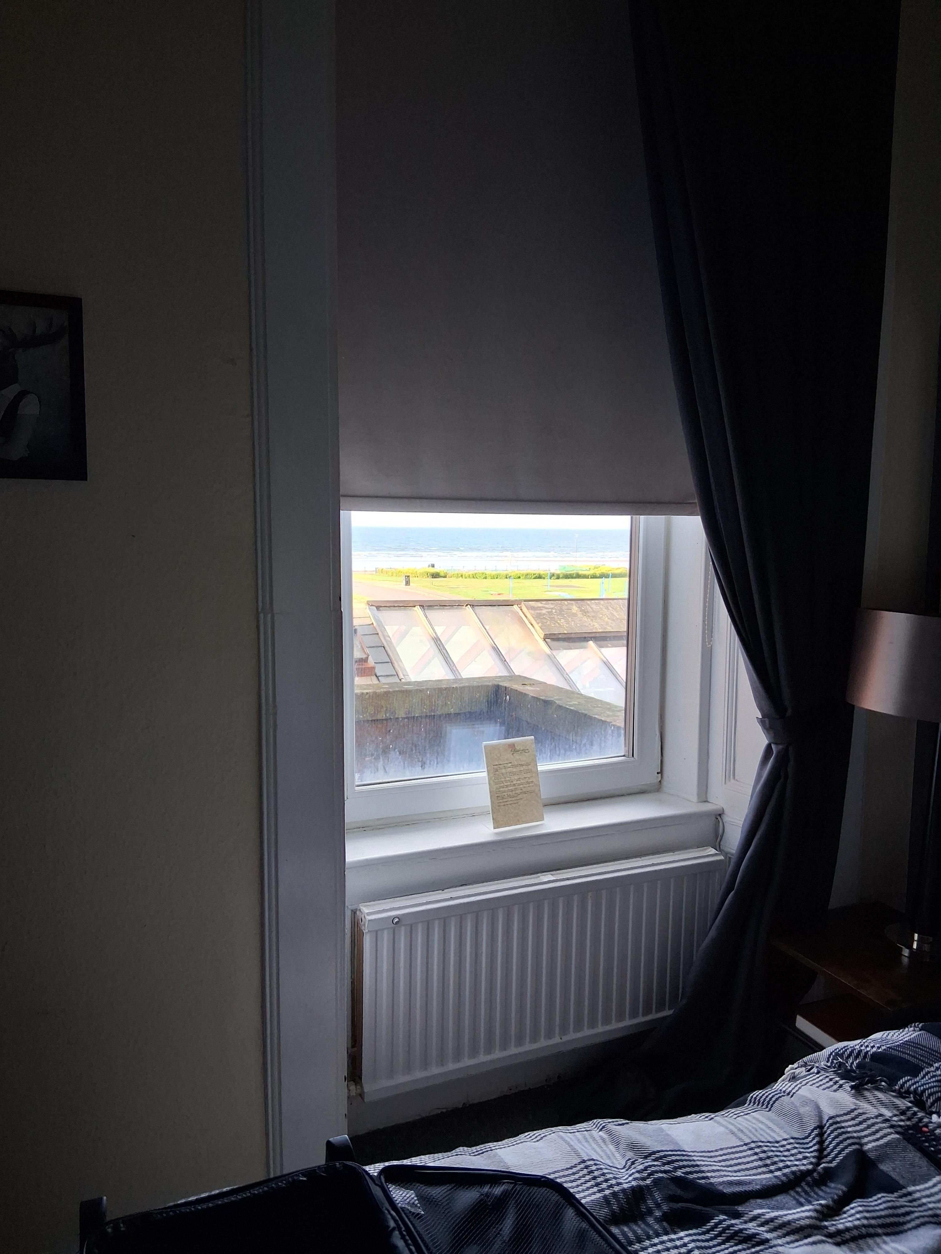 Draughty high ceiling window