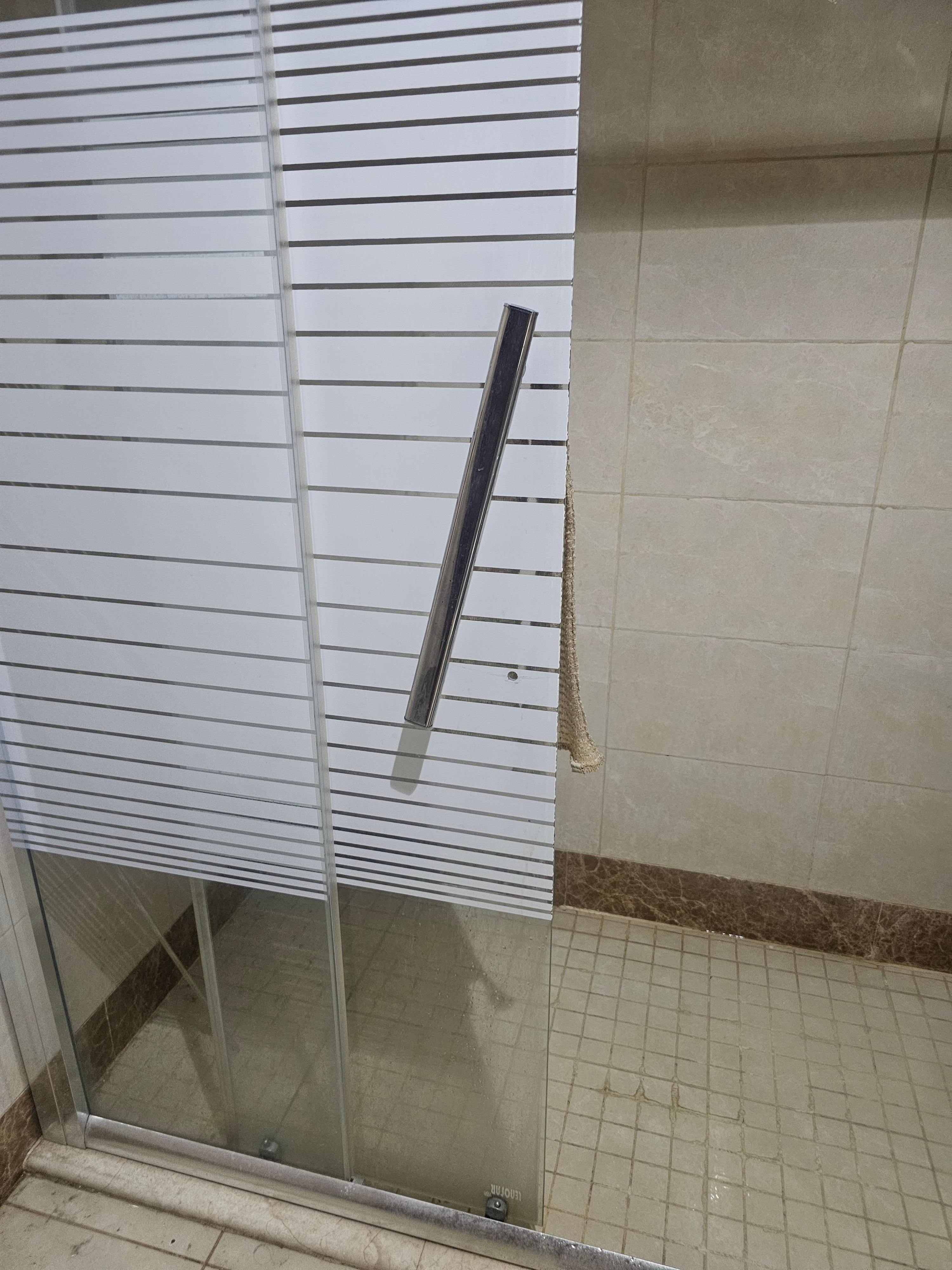 The shower door was broken.