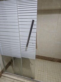 The shower door was broken.