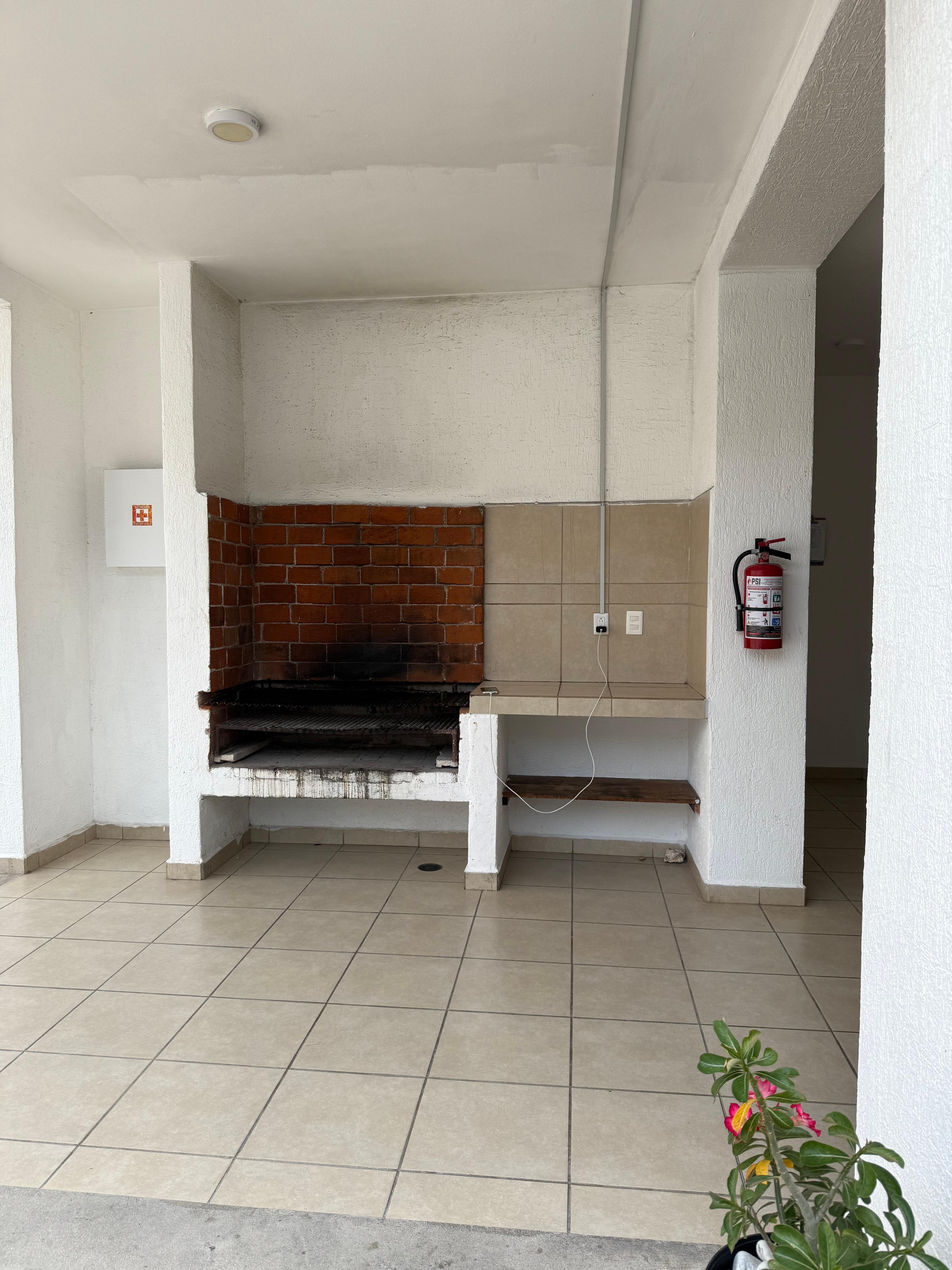 near the pool to to hang out. there where a lot of grills 