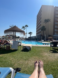 Sunbathing by the pool