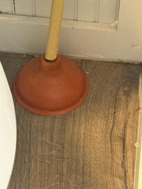 Water pouring out of the toilet