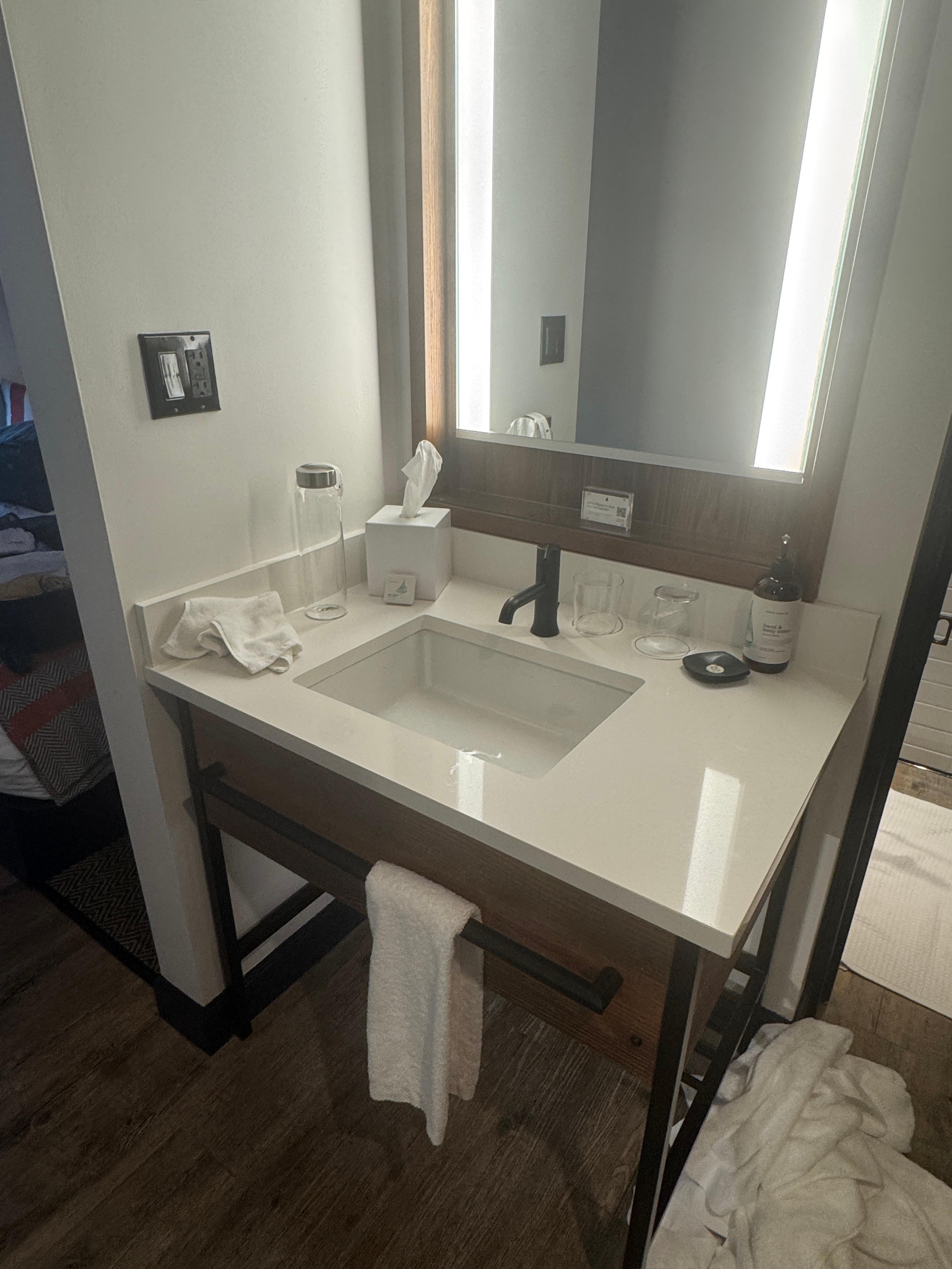 a 30" wide vanity.  very little room to keep toiletries, especially for two people.