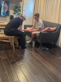 Just a momma watching here not so little boys playing cards while cooking dinner in this sweet little apartment