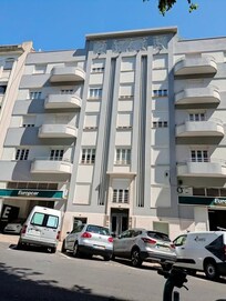 Apartment building from the street, our apartment was on the top (5th) floor to the right. Balcony was much bigger than in the lower apts.