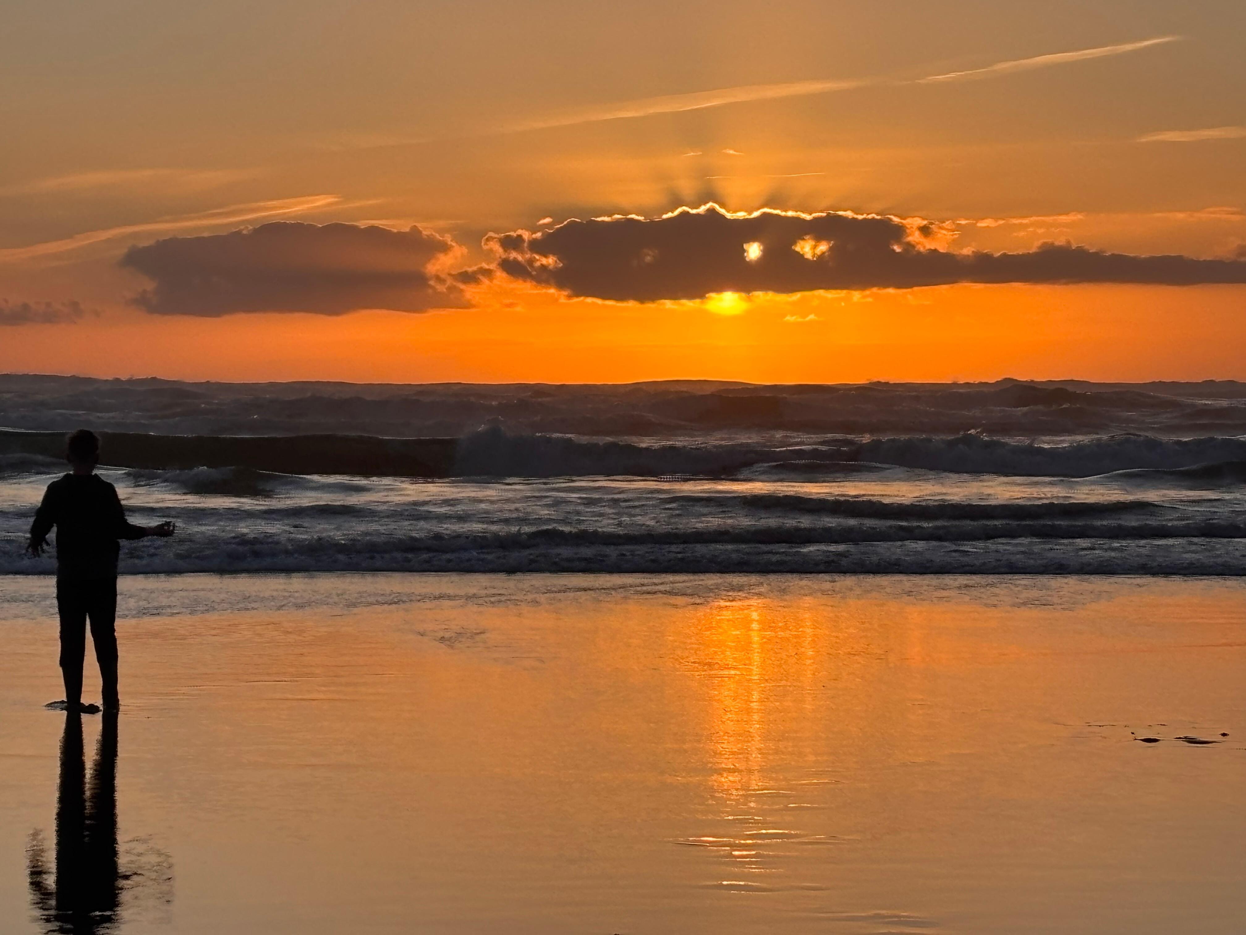 Sunset on the beach just a minute walk from the back door of the house.