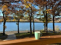 Morning coffee and view of the river and fall foliage from the deck