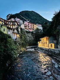 beautiful little waterfront town with a mountain stream