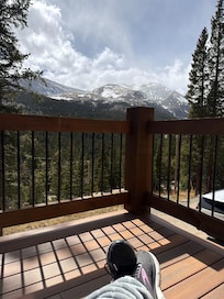Relaxing in the sun on one of the Adirondack chairs on the deck.