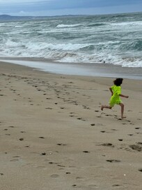 A run on the beach a few yards from the house.