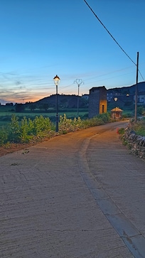 View back up the road towards the village