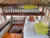 The cupola with bunk beds (aka "the tree house") which is all windows and gets warm