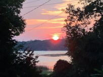 August sunrise from the backyard.
