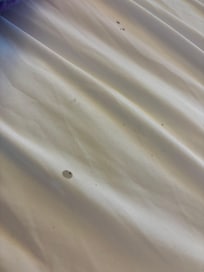 Multiple burn holes in blanket