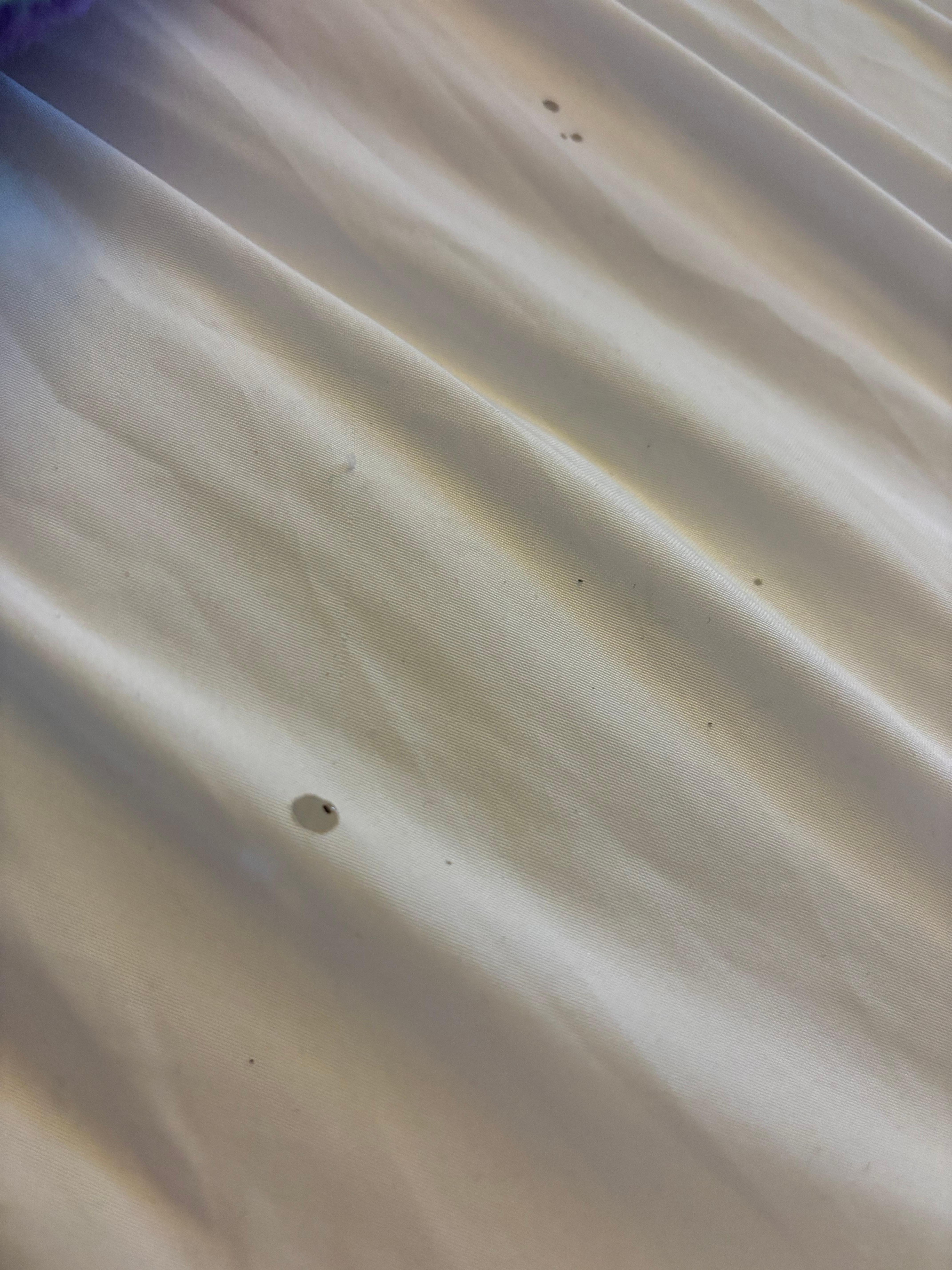 Multiple burn holes in blanket
