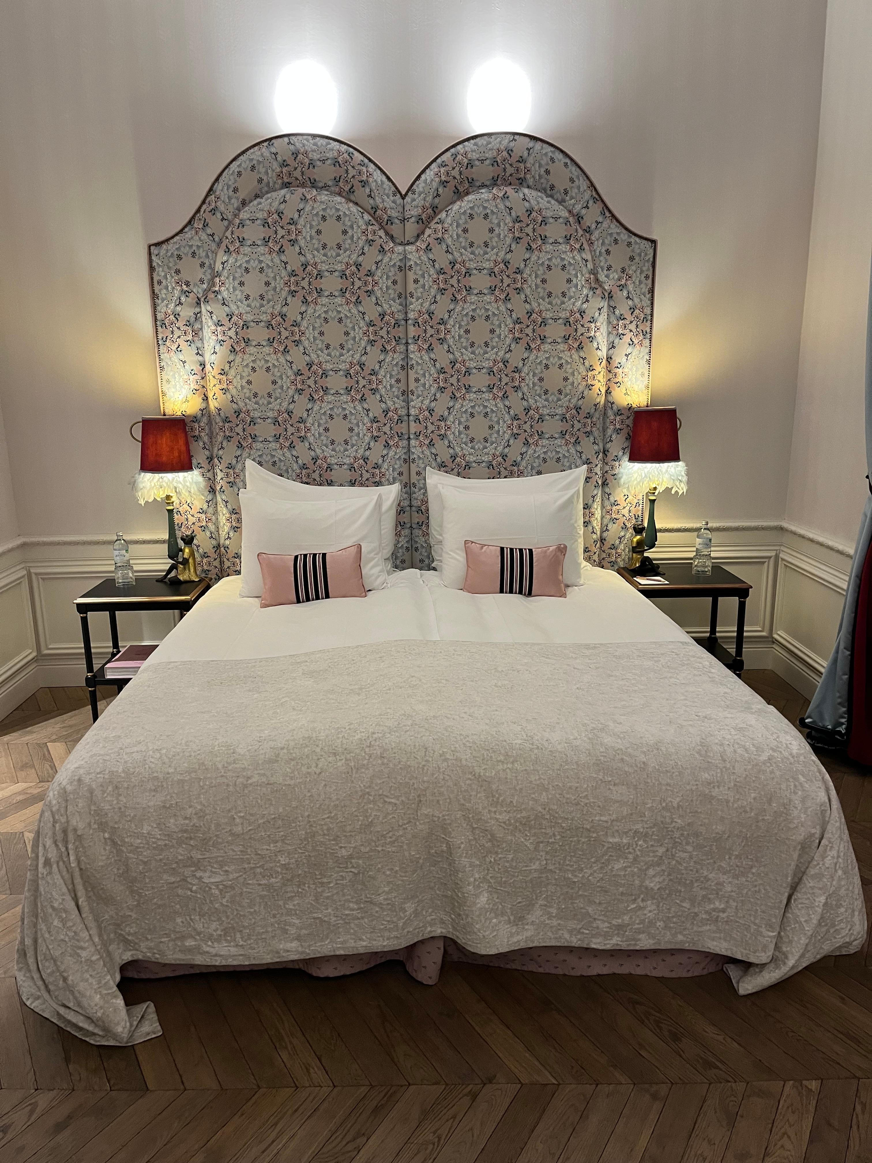 Very comfortable bed in large room.