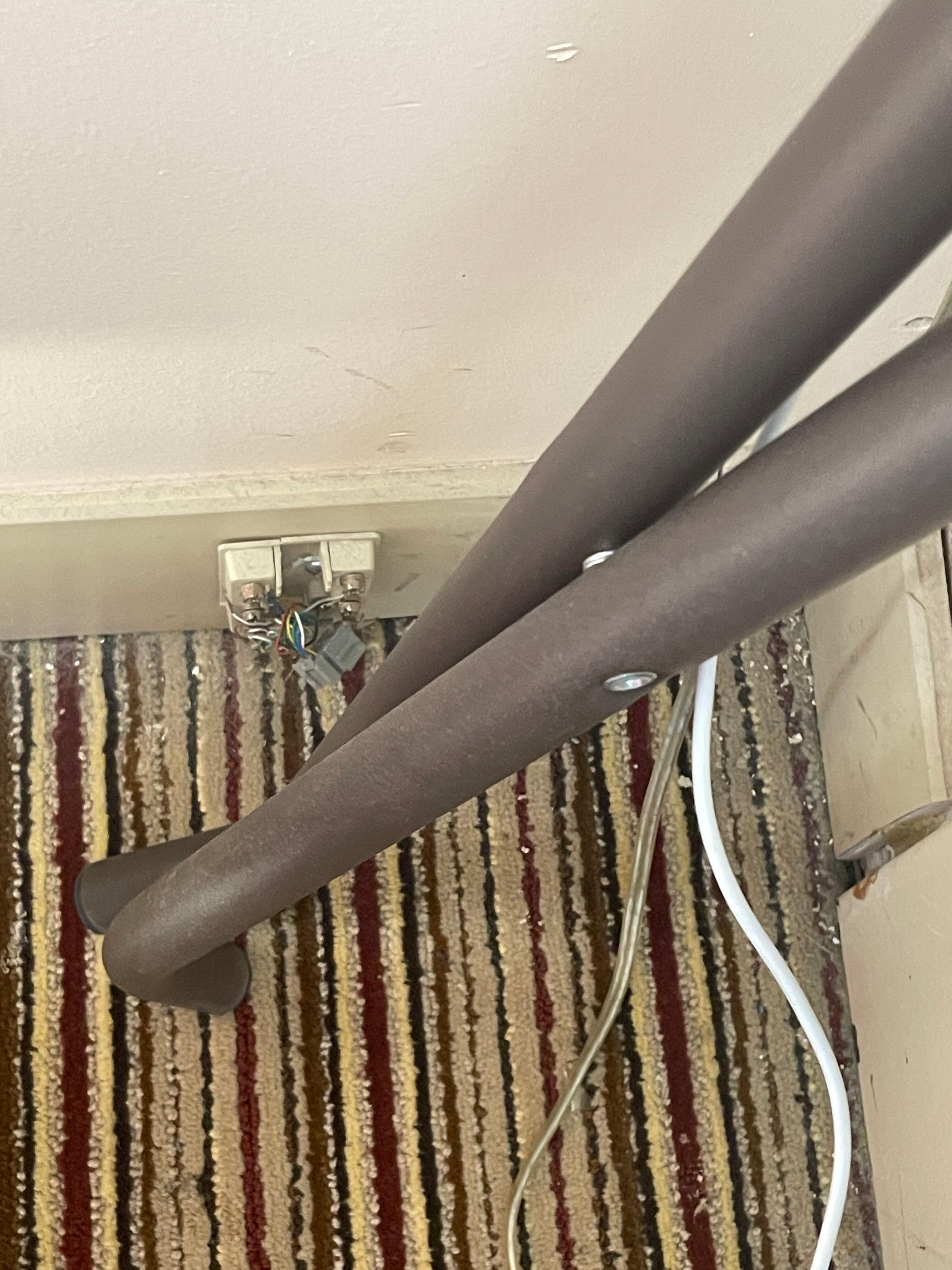 The plug to charge my phone is behind this. Is that an old landline connection?