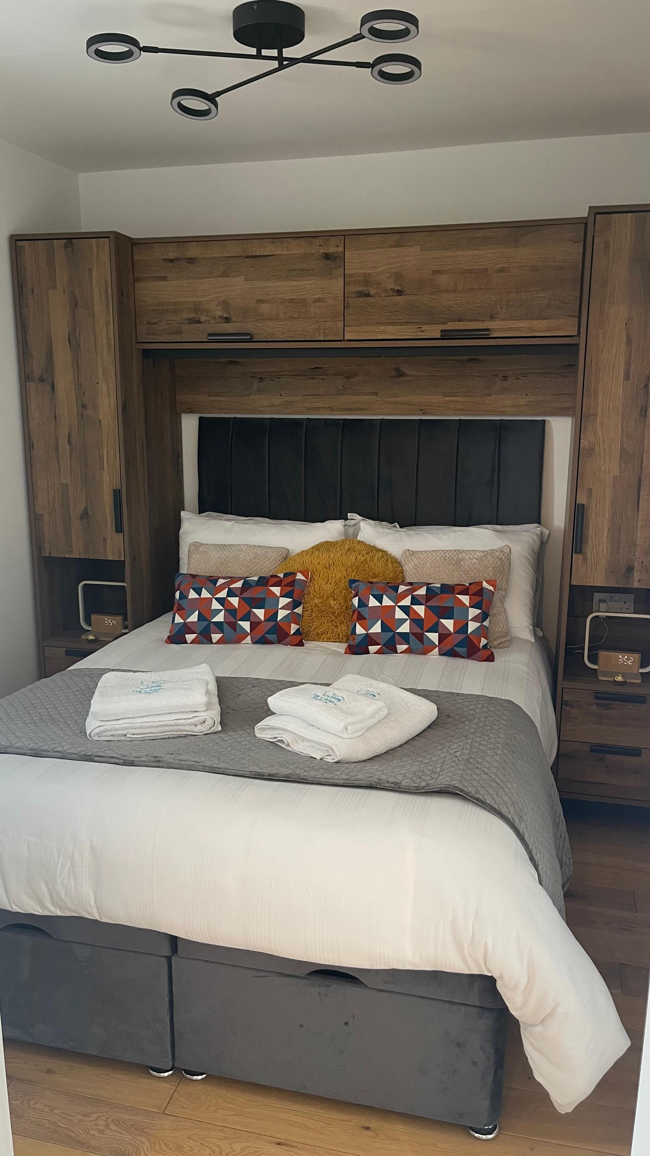 Bedroom with embroidered towels 