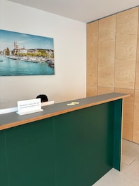 Front desk beside lockers