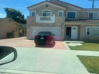 Abandon vehicles in the front of the house. Also, the neighbor refurbish cars so he makes a lot of noise.