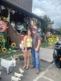 Nephew and his gal shop for souvenirs