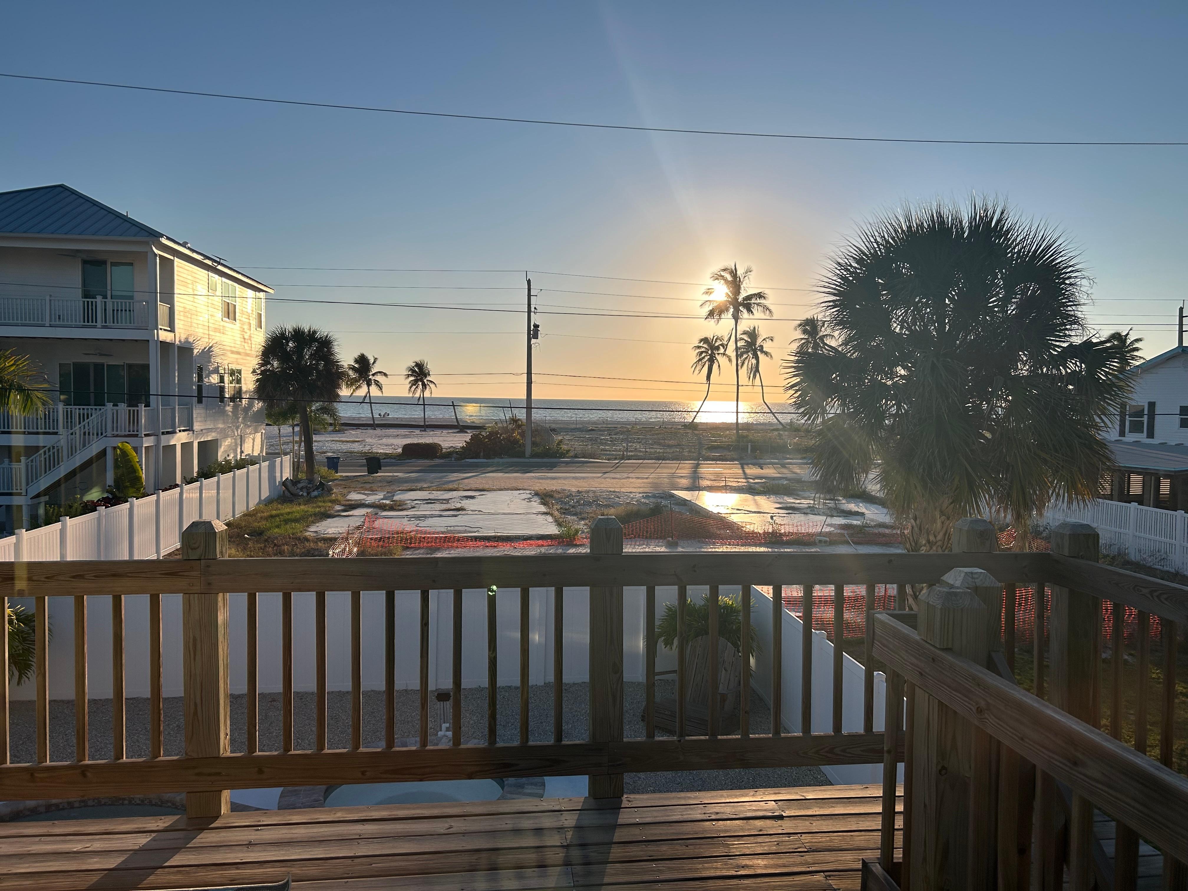 View from deck above pool towards Gulf