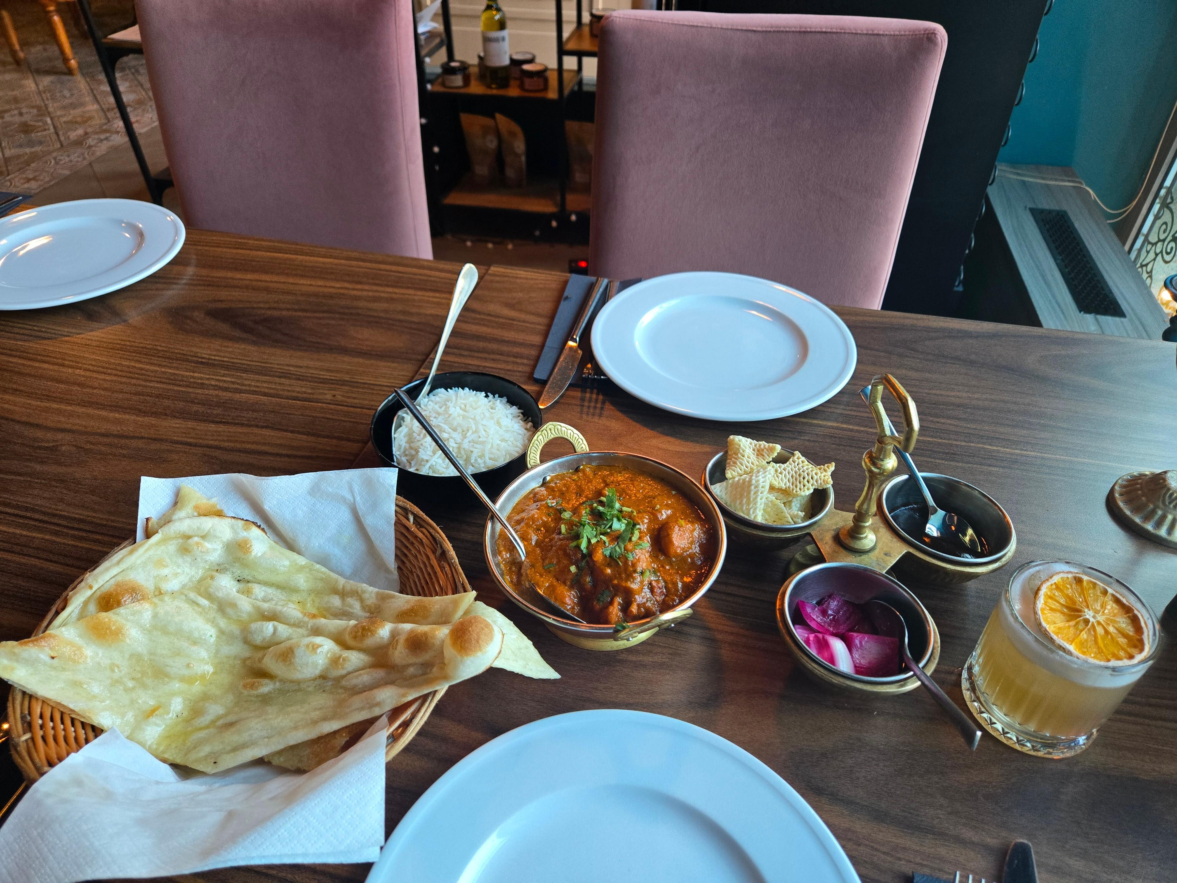 An amazing Indian restaurant right across the Sky walk behind the hotel. 