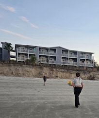 Beach fun in front of condos