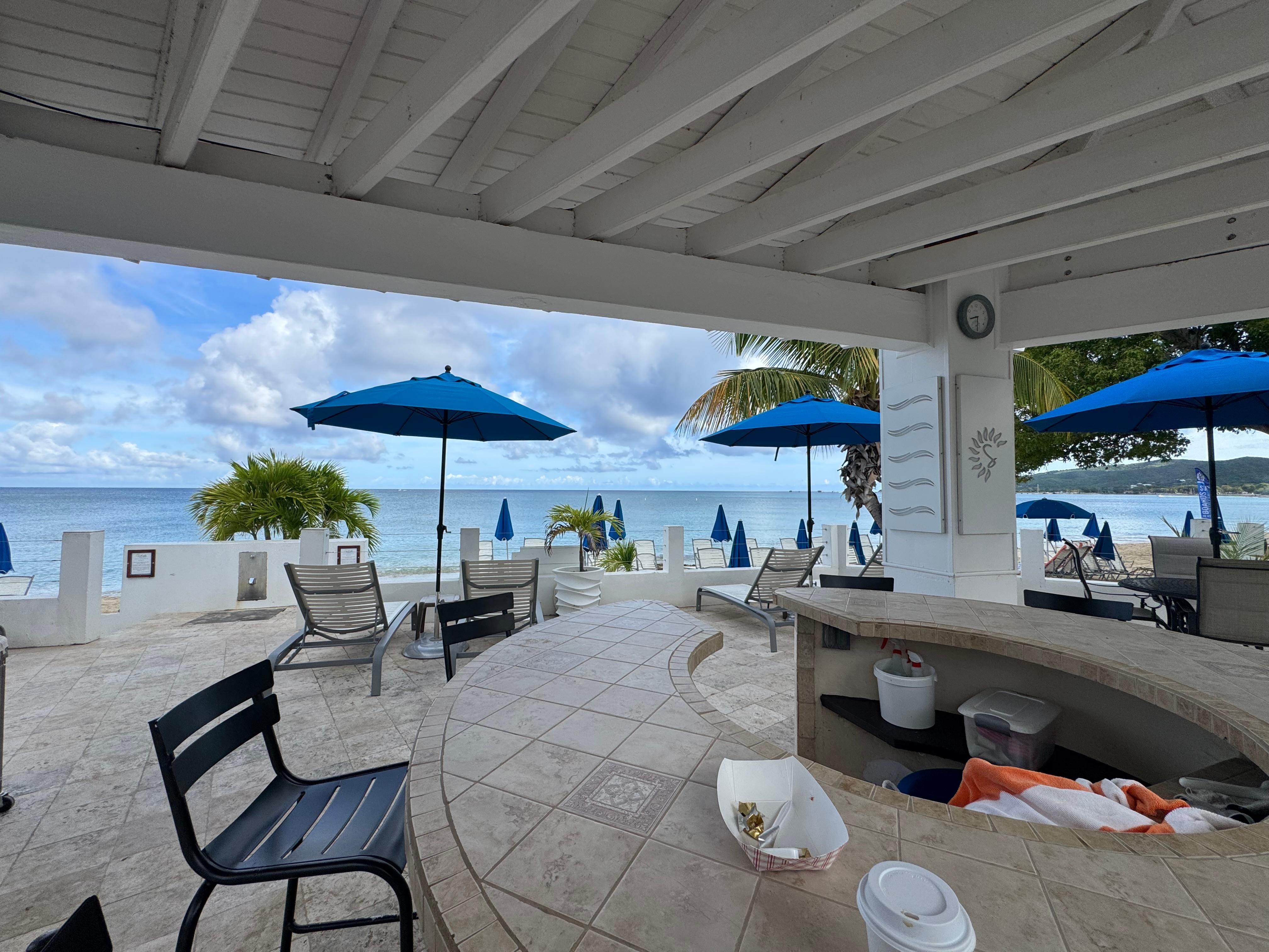 Patio and pool area overlooking the water