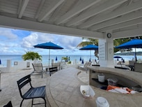 Patio and pool area overlooking the water