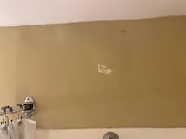 Holes above shower