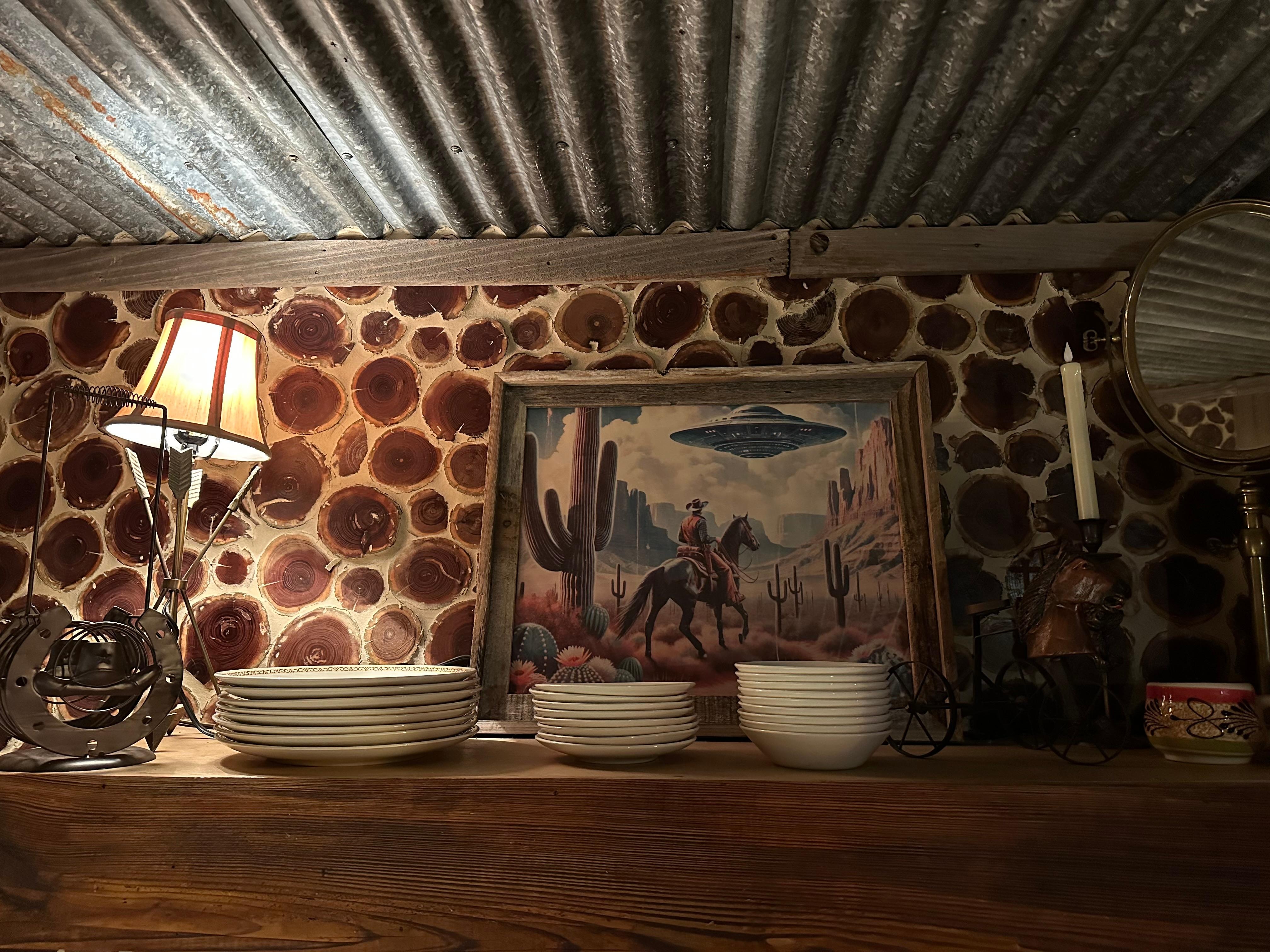 Wood cutting backsplash and fun quirky artwork