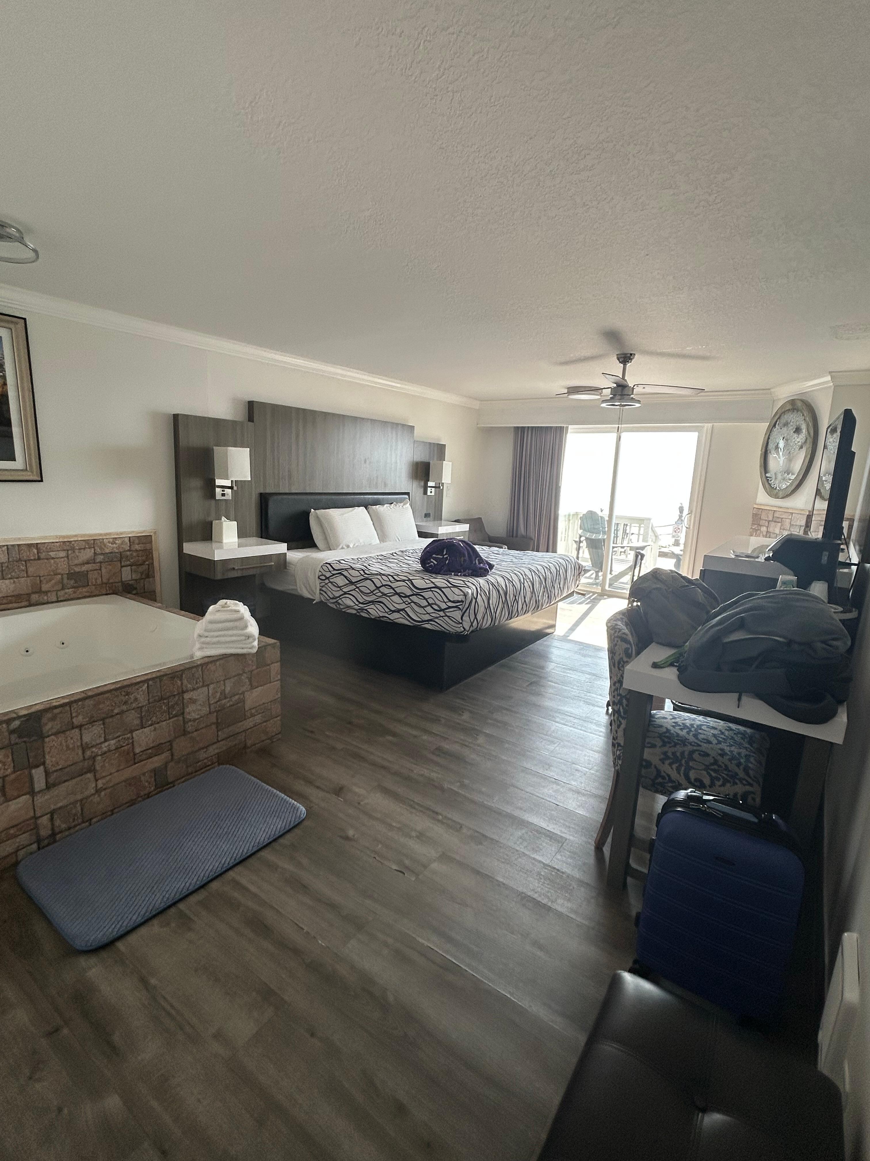 King room with jetted tub, fireplace, private deck.