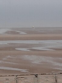 Room view with sunset on lower pic.