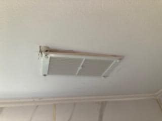 Vent hanging off ceiling