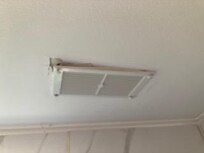 Vent hanging off ceiling