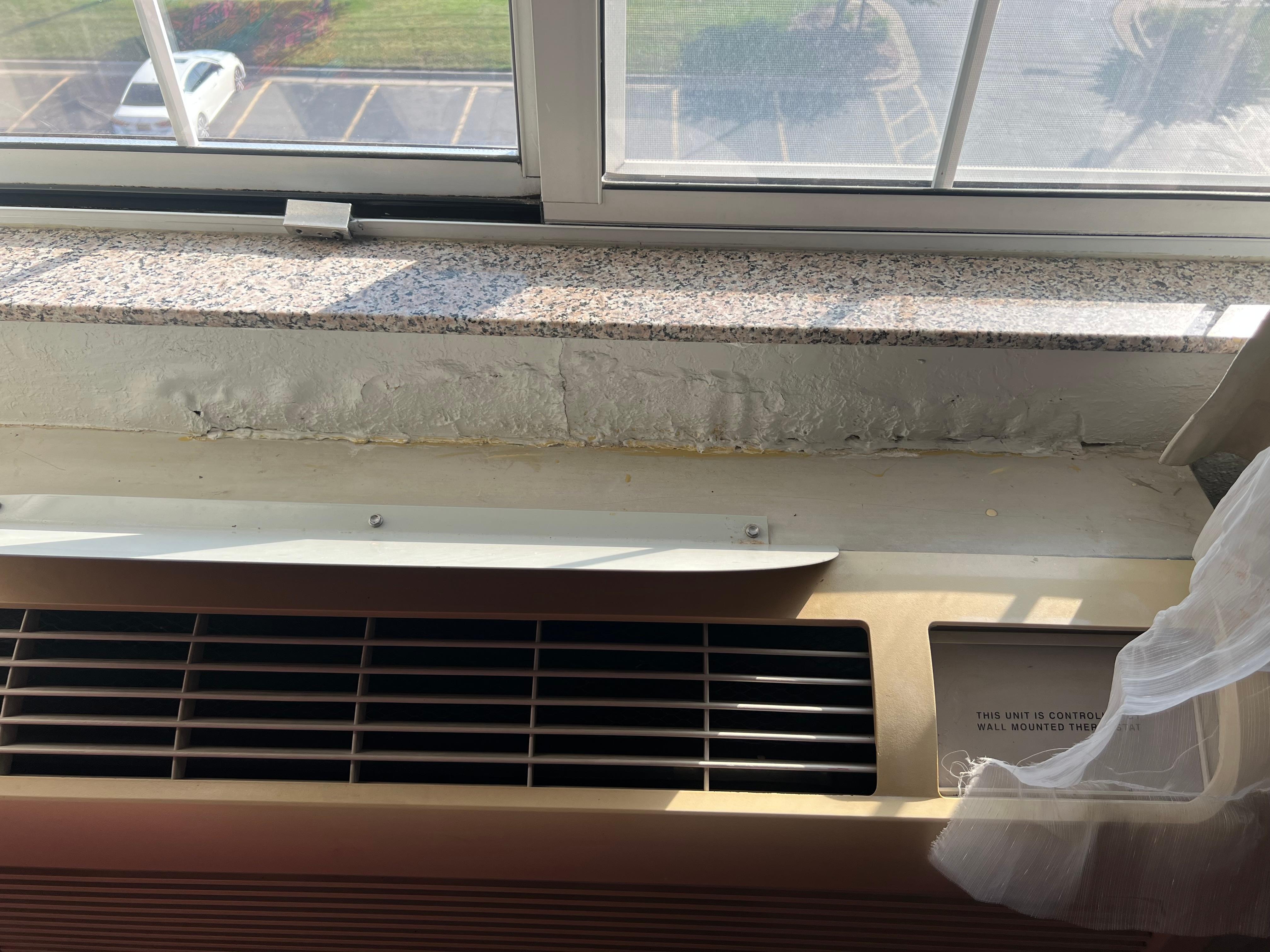 Water damage around the AC unit (no seal) 