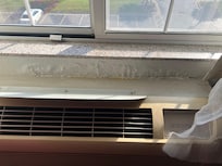 Water damage around the AC unit (no seal)