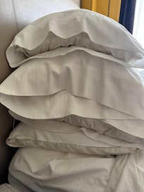 The pillow cases barely covering the pillow