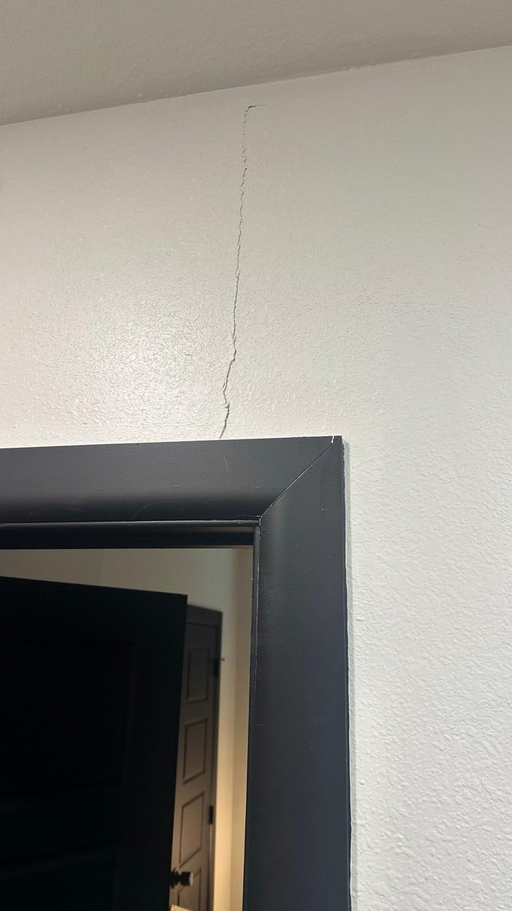 Cracks in walls and doors that won't shut.