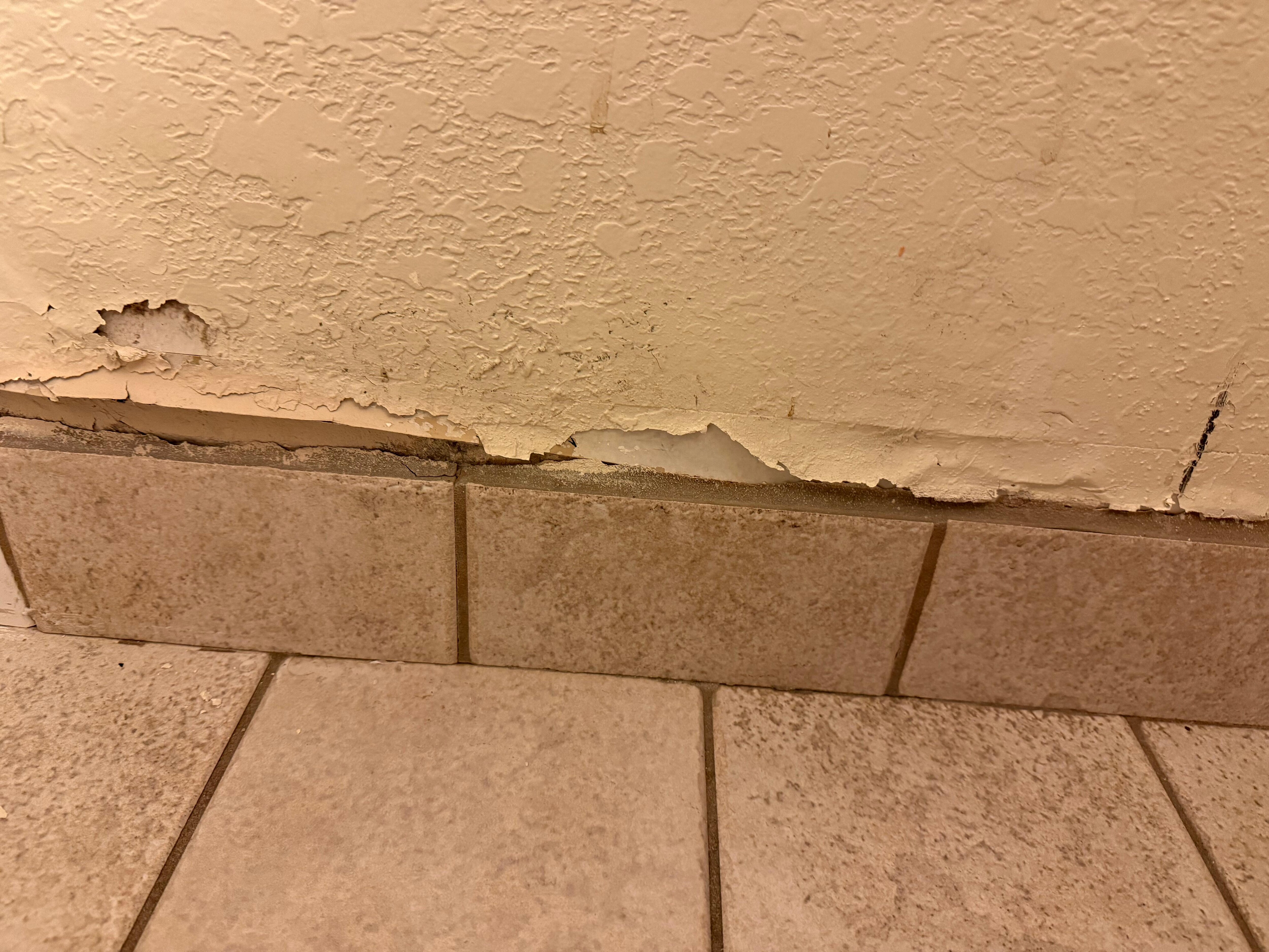 One of many places that the drywall was pealing. 