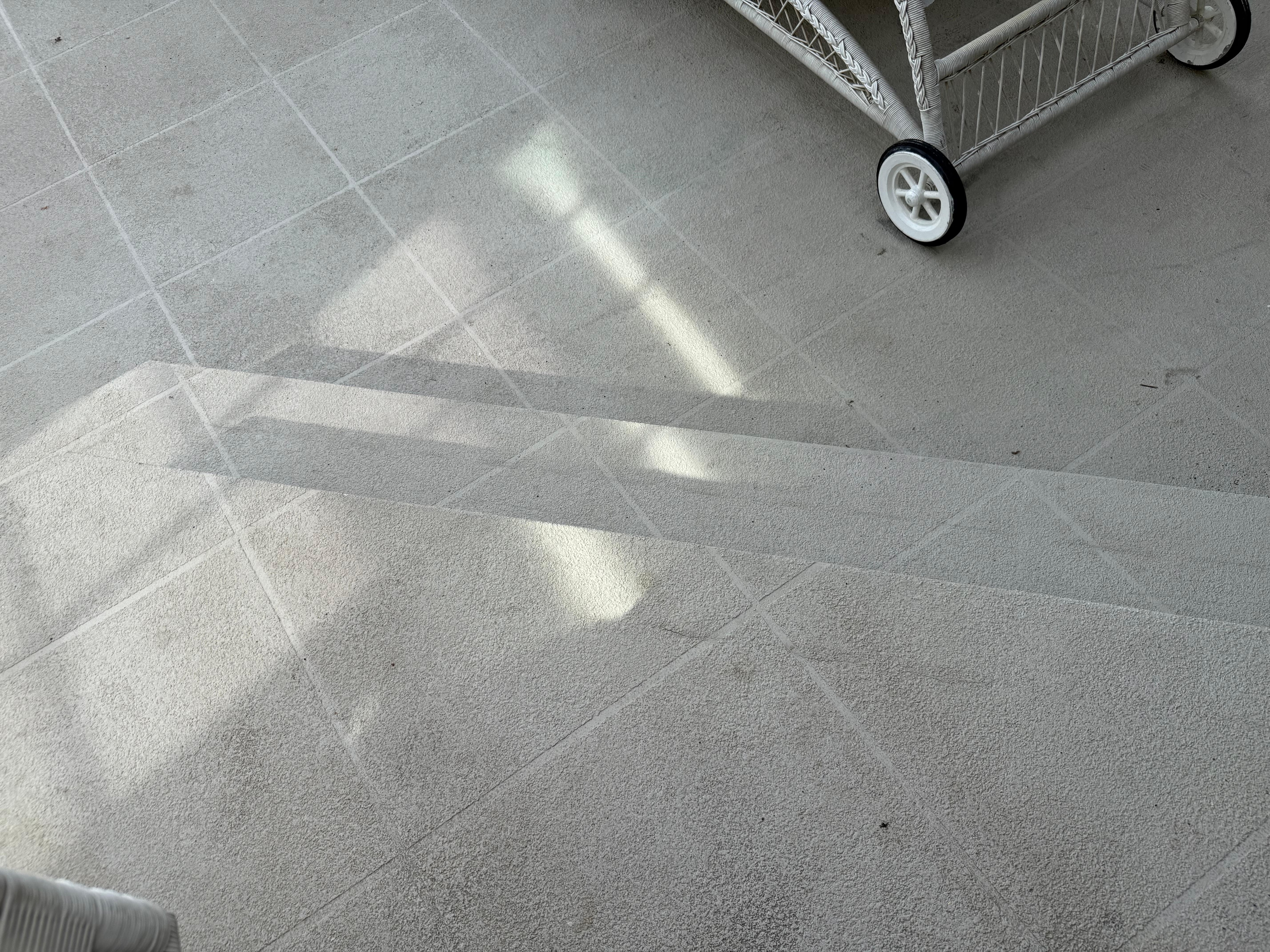 Dangerous unmarked patio steps. Blend with patio