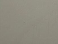 Unremovable dirt splatter on the wall