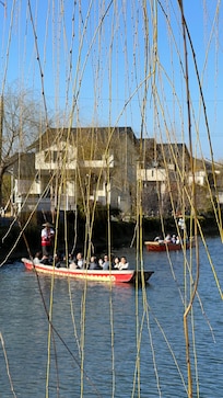 Boat ride on the Yanagawa River. Skipper sings Japanese songs