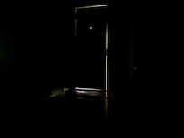 Light coming through the door at night.