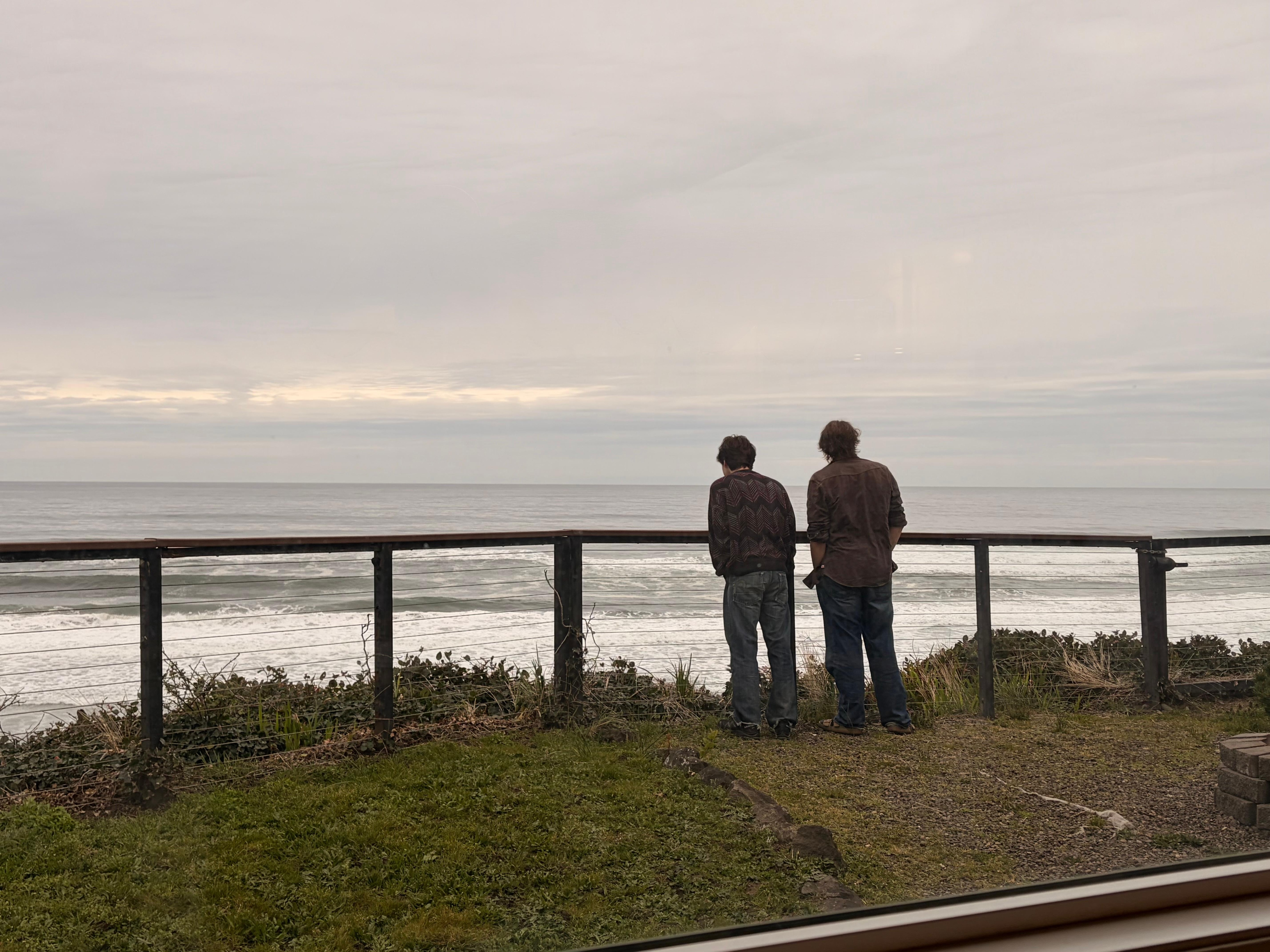 Watching the kids, watching the ocean.
