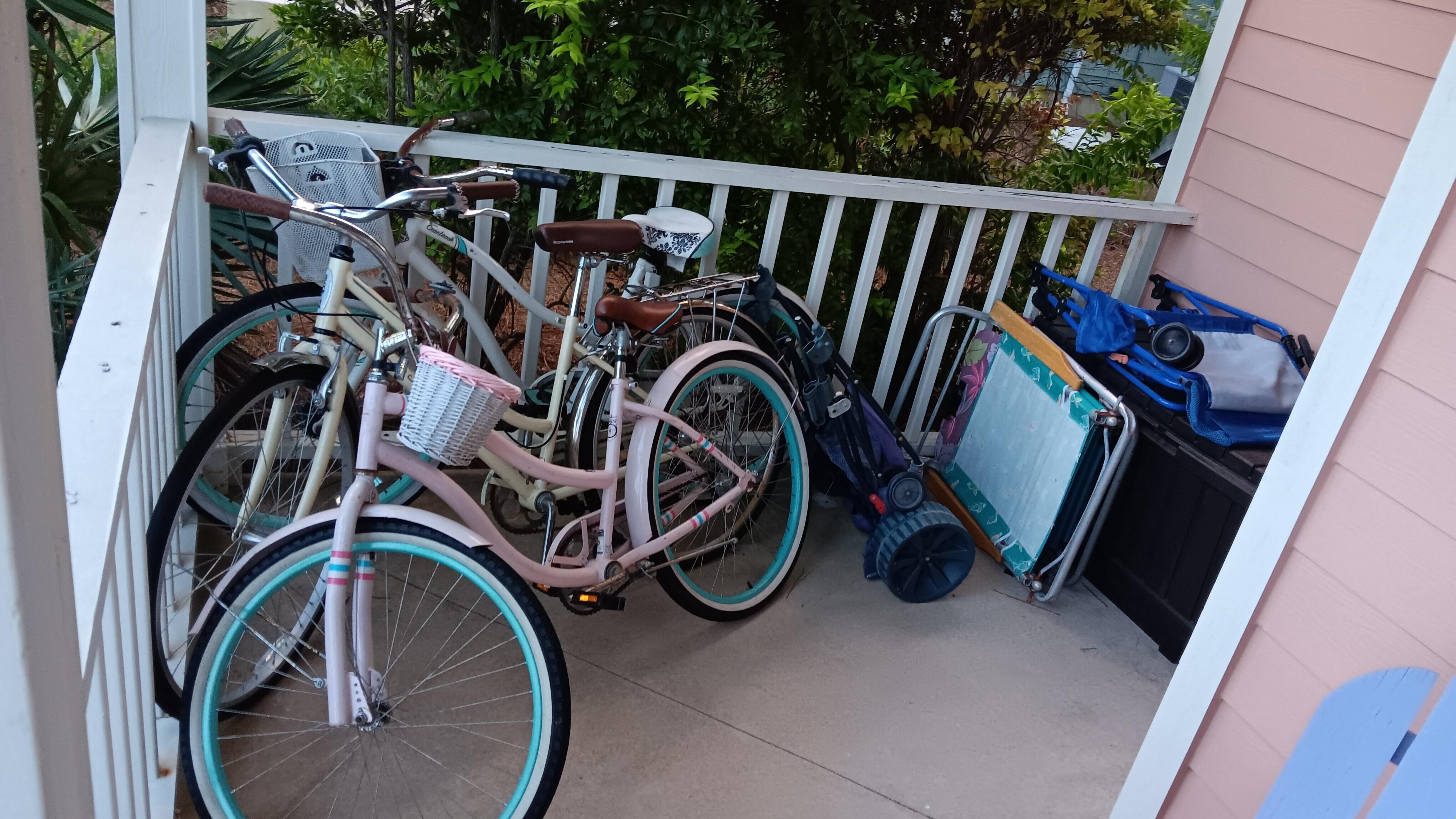 Bikes, beach chairs, beach umbrellas and sand toys.